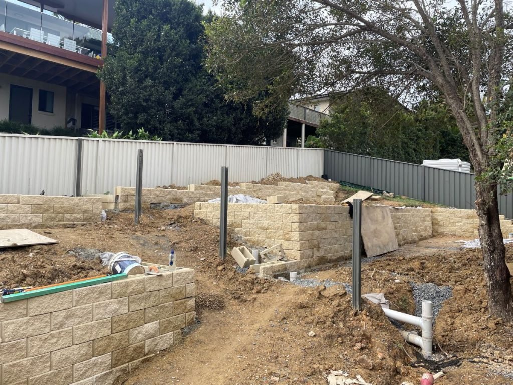 Excavator Hire Coffs Harbour Changing levels in Korora for a retaining wall